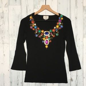 $1 Beautiful black blouse with colorful accessories around neck (S)